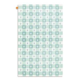 A white and light green plaid kitchen towel with small paw prints, displayed laid out flat.