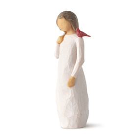 Front view of standing figure in cream dress with cardinal red bird perched on shoulder
