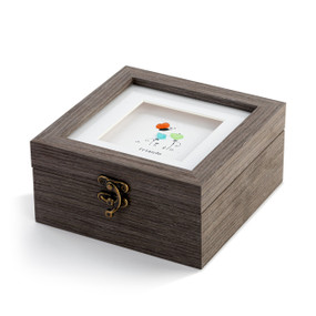 A square gray wood keepsake box with a metal clasp. The top has pebble art of flowers and a butterfly and says "friends grow together".