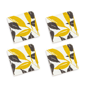 A set of four white cocktail napkins with illustrated yellow and gray leaves.