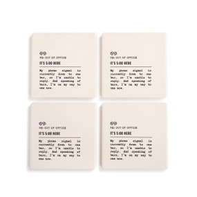 A set of four white ceramic coasters with the saying "RE: Out of Office It's 5:00 Here" with a short write up about someone in a bar.