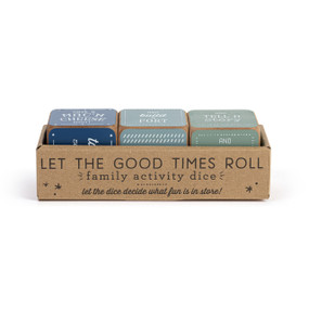 A set of three wood dice painted green and blue that have different family activities on each side, displayed in a cardboard packaging box.