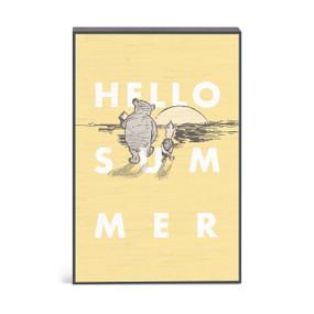 A yellow wall art with an illustration of Pooh and Piglet walking toward the sunset and the saying "Hello Summer".