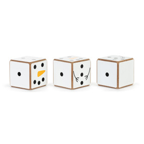 A set of three white wood dice with faces and hands that cause them to look like a snowman.
