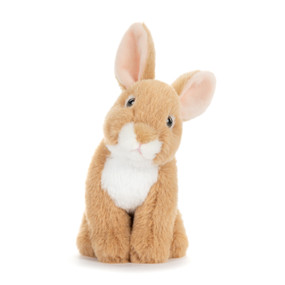A light brown plush sitting bunny with its ears up and a white belly.