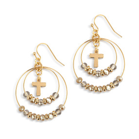A pair of multi hoop gold earrings with various gray beads on the hoops and a gold cross charm in the middle.