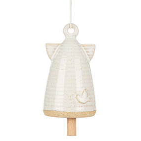 A small cream ceramic angel shaped bell with small wings and a dove at the bottom.
