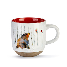 White ceramic mug with a textured base and red interior. The mug has a watercolor image of a bear in the woods.
