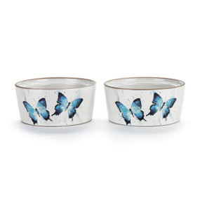 Two white ceramic ramekins with a watercolor image of blue butterflies, displayed at a slight angle to show the inner rim for stacking.