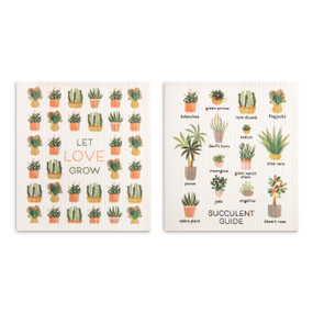 Two biodegradable dish cloths, one has plant illustrations and the saying "Let Love Grow" and the other has illustrations of different succulents.