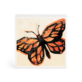 A small white box artwork of an orange and black butterfly.