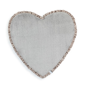 A gray heart shaped blanket with a ruffled gray satin edge.