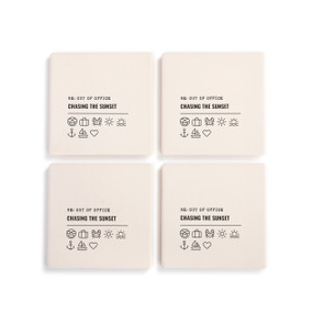 A set of four white ceramic coasters with the saying "RE: Out of Office Chasing the Sunset" with a set of emoji images related to a beach vacation.