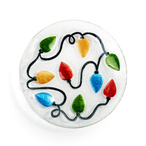 A round mini glass plate with a multicolored string of Christmas lights.