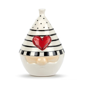 A black and white ceramic candy dish shaped like the hat and face of a gnome. The hat is the lid and has a raised red heart on it.