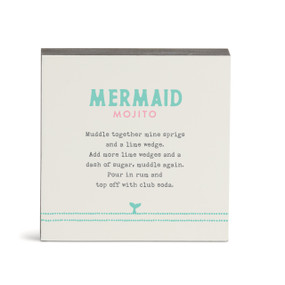 A white square wall art with a basic recipe for a Mermaid Mojito written in green.