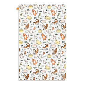 A white kitchen towel with illustrated cartoon cats, displayed laid out flat.