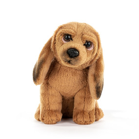 A brown and black plush bloodhound dog beanbag.