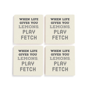 A set of four white ceramic coasters with the saying "When Life Gives You Lemons, Play Fetch".