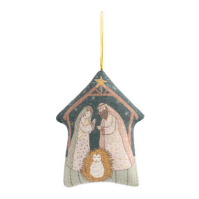A stable shaped plush ornament with an illustration of the holy family.