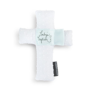 A white plush cross with the saying "baby's baptism" in light blue in the middle.