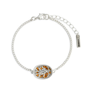 A silver chain bracelet with an oval silver tree and mustard seed charm.