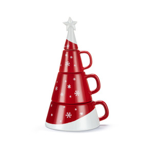 A red and white set of stacking mugs that look like a tree while stacked. There are white snowflakes in the red portion.
