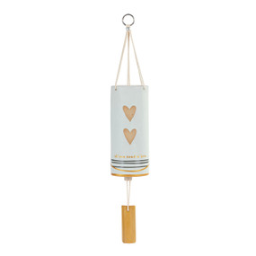 A white tubular ceramic wind chime with a wood chime, two hearts and horizontal lines at the bottom. The chime says "all you need is love".