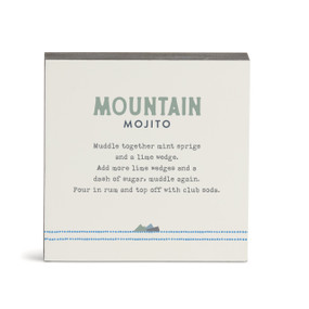 A white square wall art with a basic recipe for a Mountain Mojito written in blue.