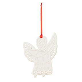 A white mini angel ornament hanging from a red ribbon. The ornament has the saying "Blessed" and decorative holes and images on the ceramic.