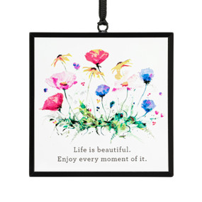 A square suncatcher with watercolor wildflowers and the saying "Life is beautiful. Enjoy every moment of it".