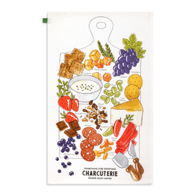 A white kitchen towel with colorful illustrations of possible ingredients on a charcuterie board.