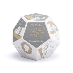 A 12 sided foam white and gray dice with activities on each side celebrating Jesus birthday.