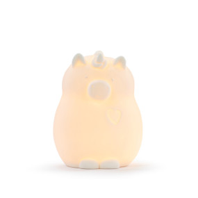 A ceramic unicorn shaped night light displayed lit up.