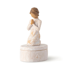 Cream oval resin box, 3-D figure in prayer pose atop lid, in cream dress carved with birds and flowers