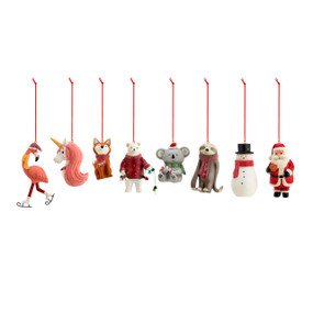 An assortment of 8 small ceramic character ornaments, such as a unicorn and a sloth, each on a red string.