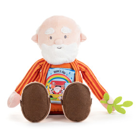 A fabric doll of Noah with a fabric book attached to his chest titled "Noah's Ark".
