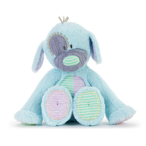 A light blue plush puppy with a knit purple nose and eye patch. The puppy has purple and green ears, tummy and paws.