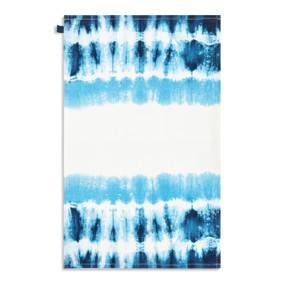 A white kitchen towel with a blue tie dye pattern, displayed laid out flat.