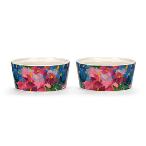 Two white ceramic ramekins with an image of pink and blue hydrangea, displayed at a slight angle to show the inner rim for stacking.
