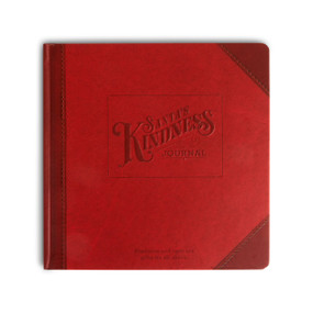 A bound red journal that says "Santa's Kindness Journal". A bound red journal that says "Santa's Kindness Journal".