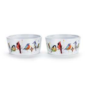 Two white ceramic ramekins with a watercolor image of different songbirds, displayed at a slight angle to show the inner rim for stacking.