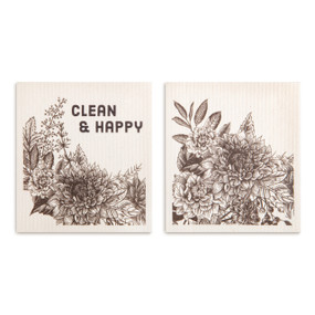 Two black and white biodegradable dish cloths, each has a black and white drawn floral pattern and one says "Clean & Happy".