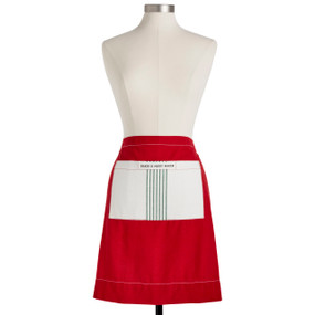 A red half apron with a green and white vertical stripe pocket that reads "Baker & Merry Maker", displayed on a mannequin.