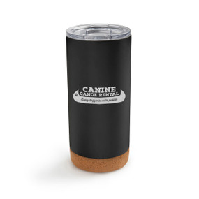A black cork bottom tumbler with the saying "Canine canoe rental. Every doggie loves to paddle"