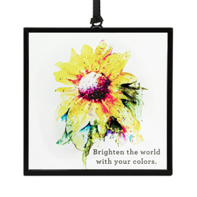 A square suncatcher with a watercolor sunflower and the saying "Brighten the world with your colors".
