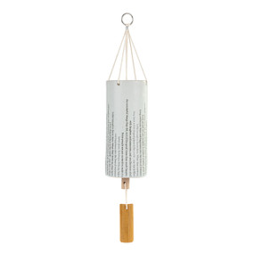 A white tubular ceramic wind chime with a wood chime and typed vertical lines of writing around the outside.