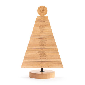 A wood tree made of individual pieces of wood that each have a different scripture verse on them for Advent.