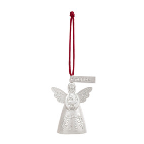 A mini white bell ornament shaped like an angel holding a dove. There is a tag at the top with the word "Peace".