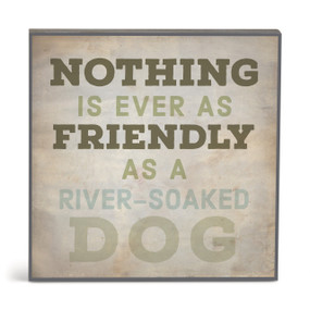 A square brown wall art with the saying "Nothing is ever as friendly as a river-soaked dog".
